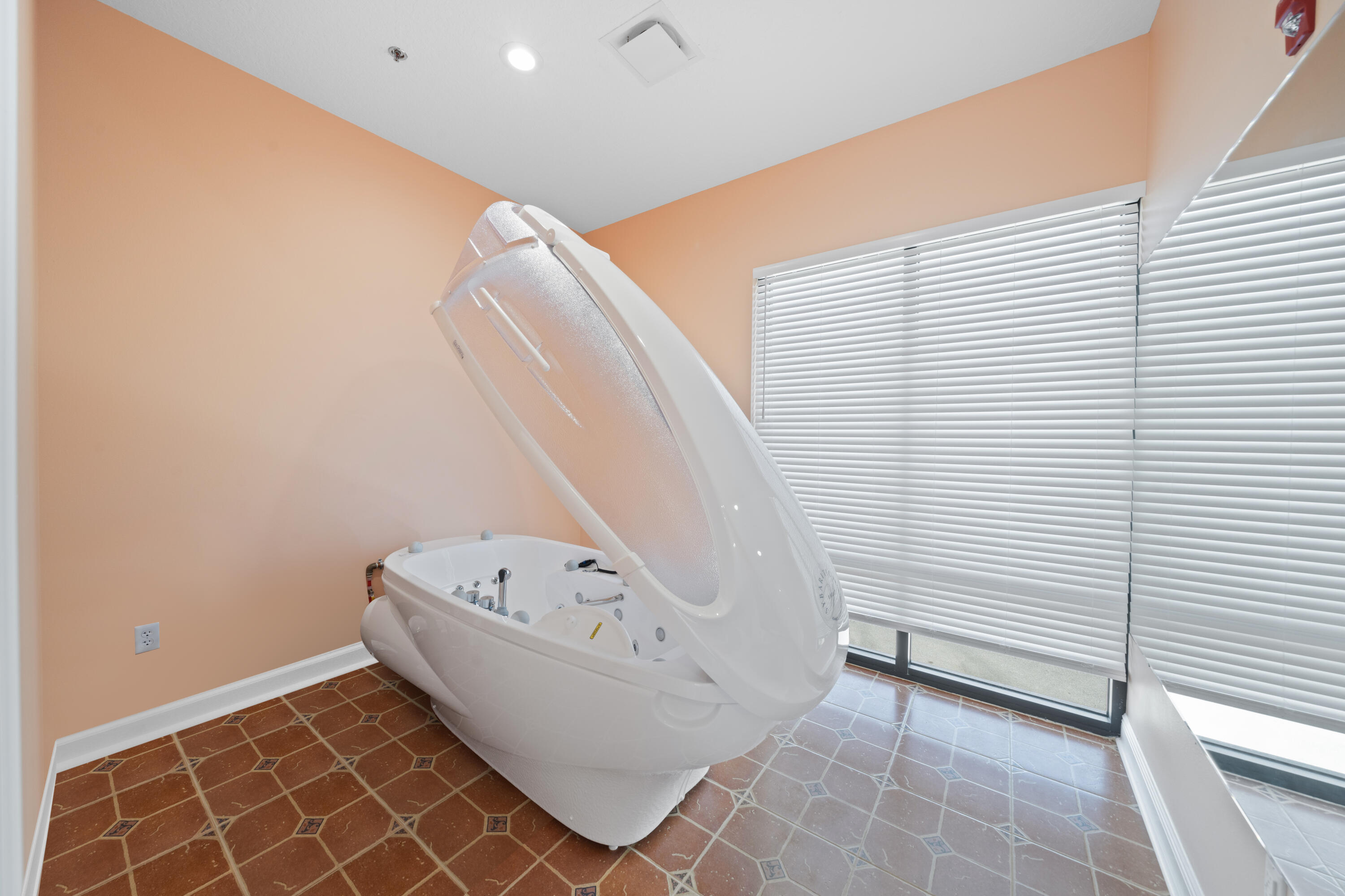 735 Pilot Lane, Unit 1004 Merritt Island, FL 32952 - Photo 31 of 46 a bathroom with a bathtub and shower