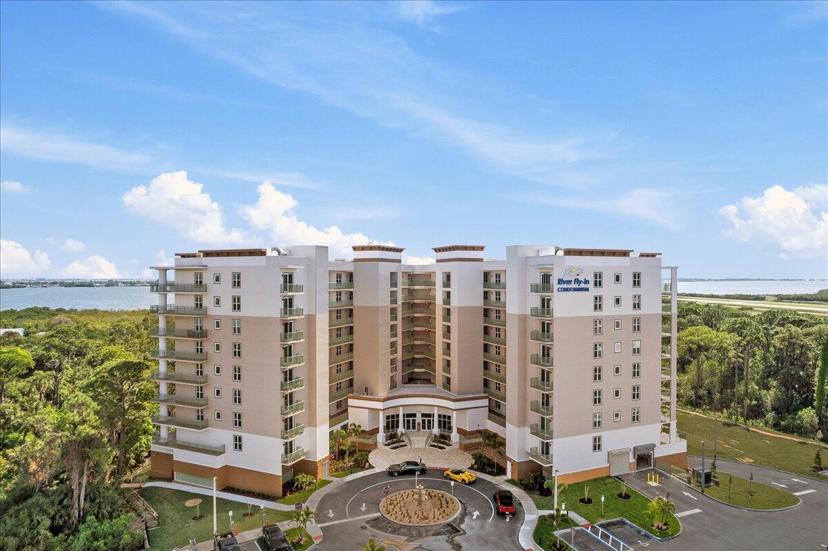 735 Pilot Lane, Unit 1004 Merritt Island, FL 32952 - Photo 4 of 46 a view of a city with tall buildings