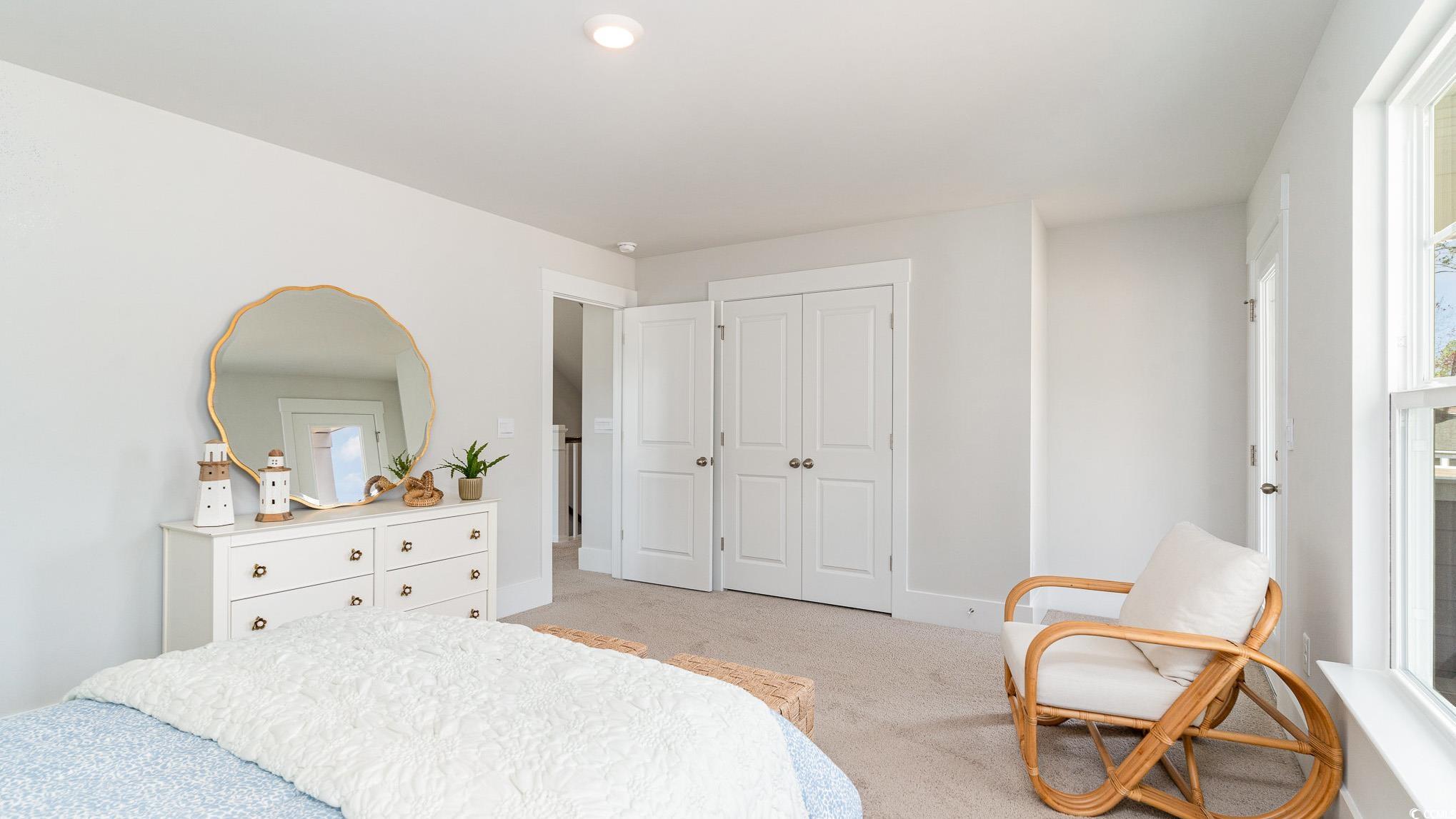 506 Haven View Way Murrells Inlet, SC 29576 - Photo 27 of 40 Bedroom featuring light carpet, a closet, and baseboards