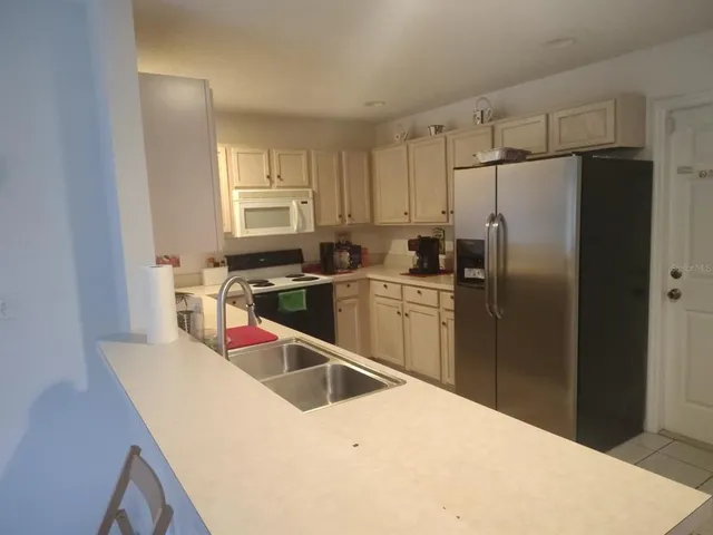 $2,000 | 449 Hollinghead Loop, Davenport, FL 33896