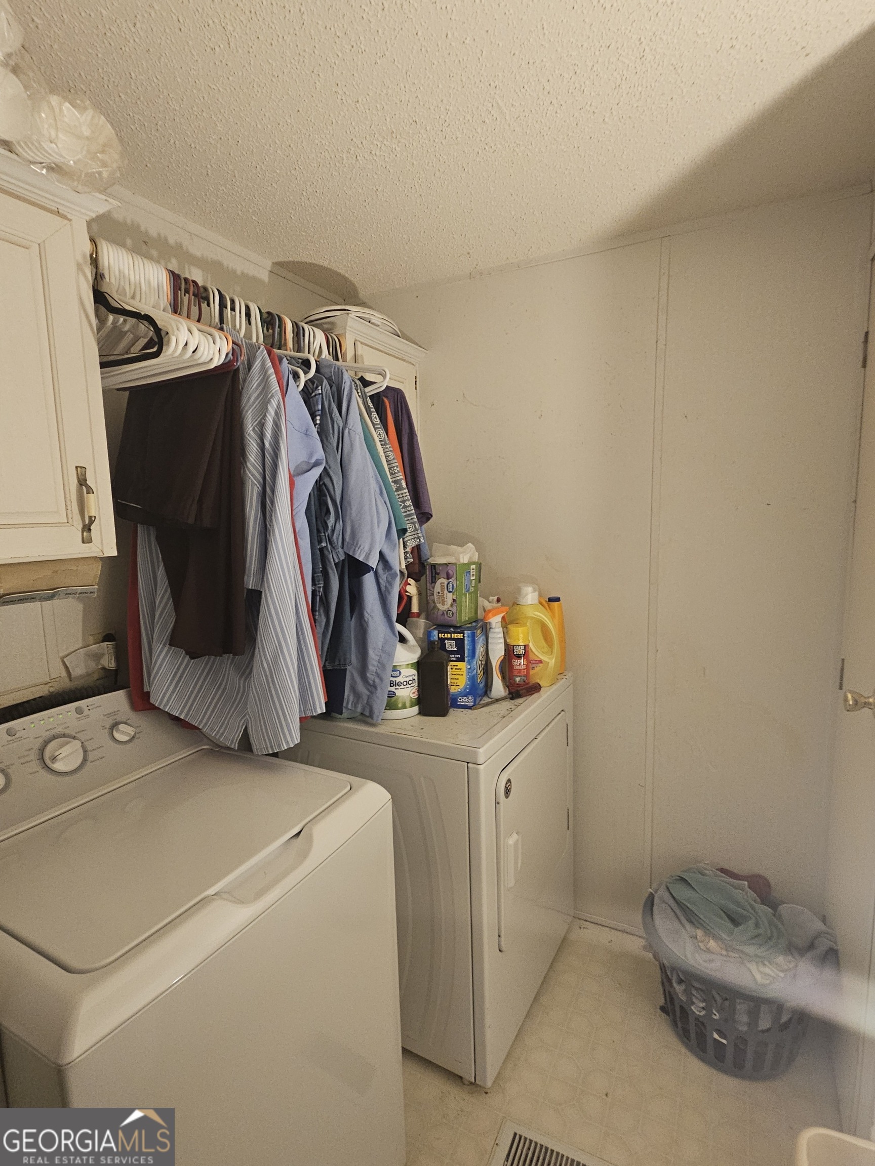 267 Williams Road Tallapoosa, GA 30176 - Photo 13 of 14 a view of walk in closet with clothes and shoes