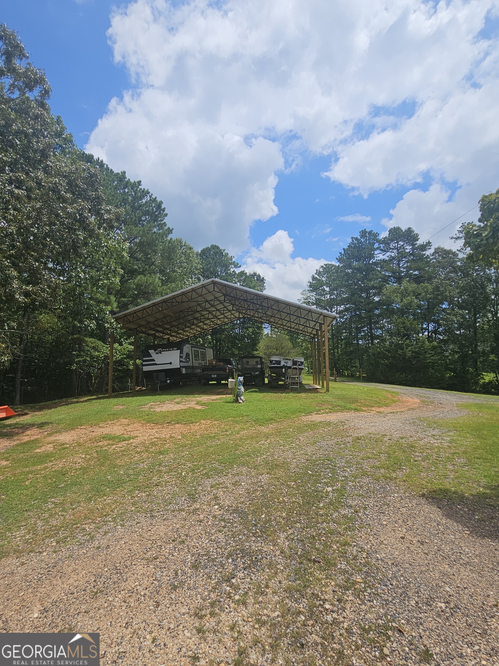 267 Williams Road Tallapoosa, GA 30176 - Photo 6 of 14 a view of a field with an trees