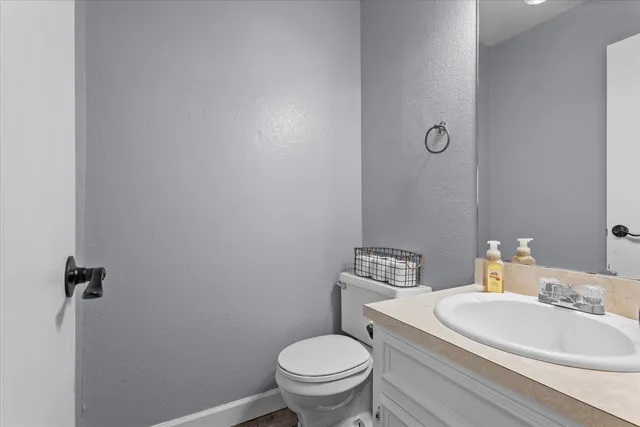 a bed room with a bed and a window