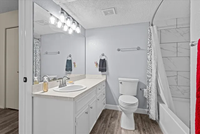 a bathroom with a bath tub and a shower