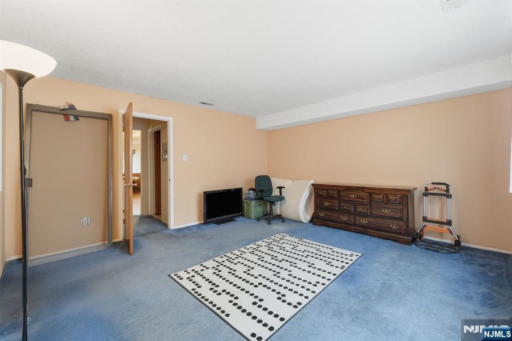 307 Edison Glen Terrace, Unit 307 Edison, NJ 08837 - Photo 8 of 10 a view of an empty room and a window