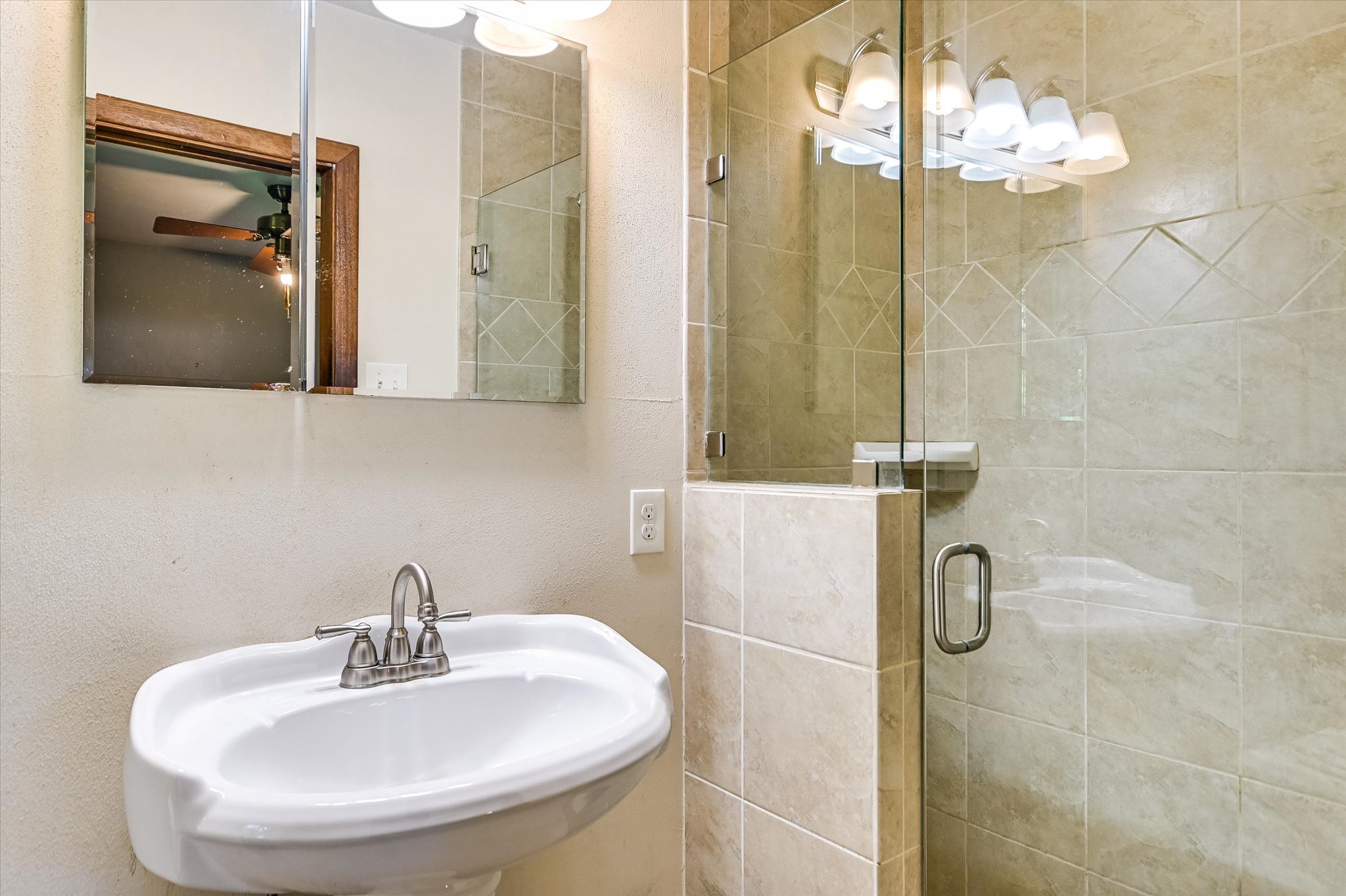 502 Sunset Circle Austin, TX 78704 - Photo 14 of 27 Attached primary bath with shower