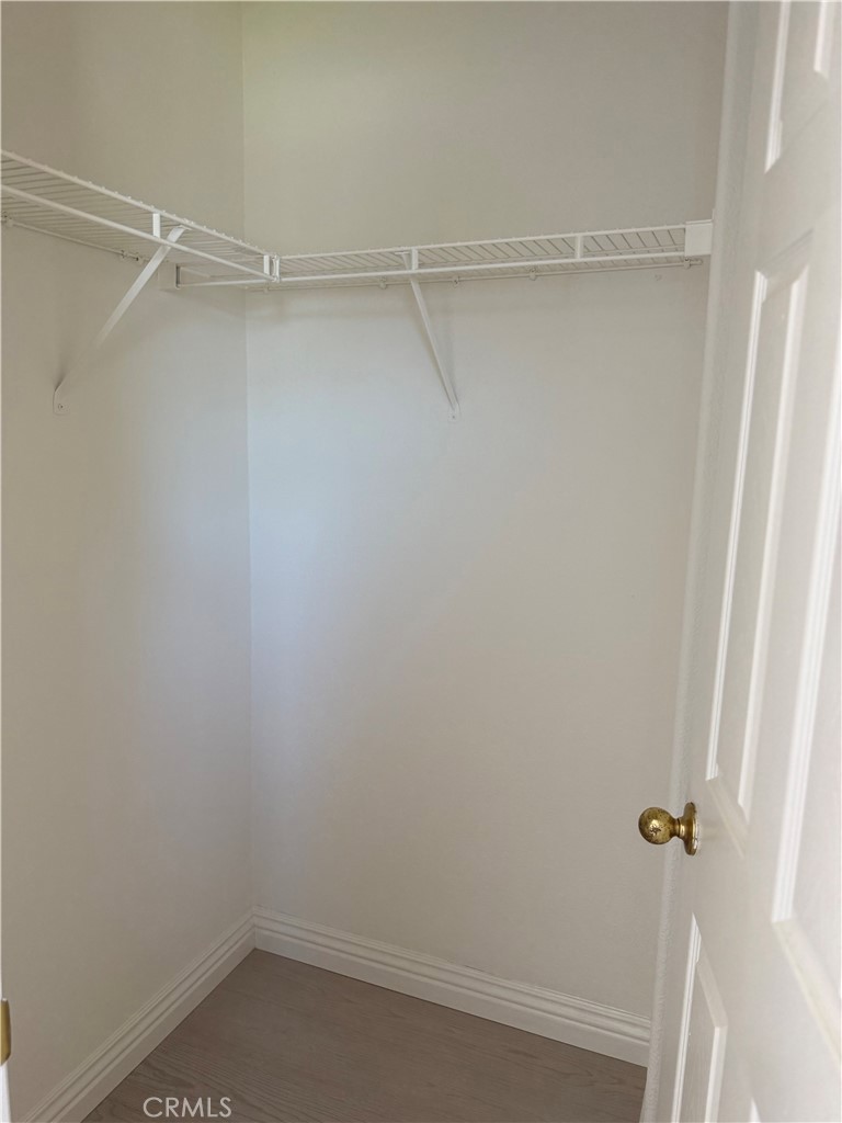 1657 Stone Creek Road Beaumont, CA 92223 - Photo 16 of 32 a view of an empty walk in closet