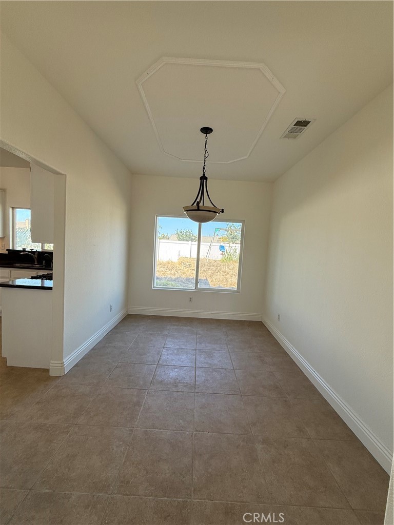 1657 Stone Creek Road Beaumont, CA 92223 - Photo 9 of 32 a view of empty room with window