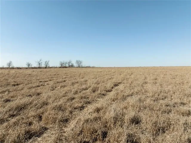 a view of beach and an ocean