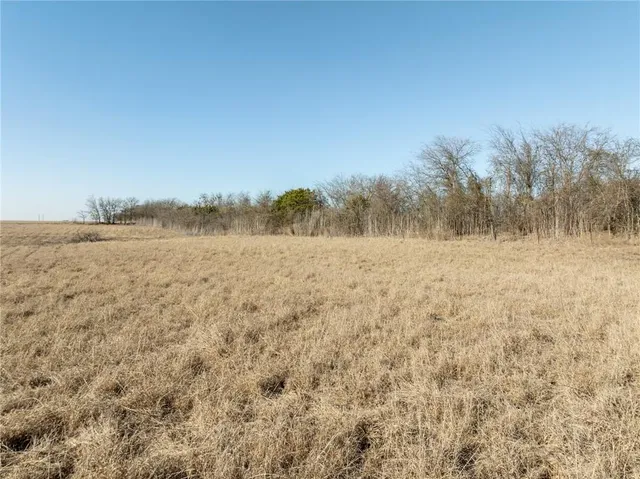an aerial view of beach and ocean