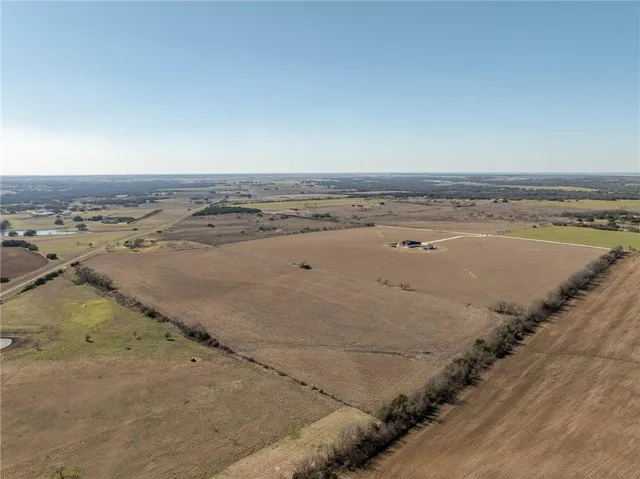 an aerial view of beach and ocean