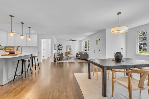 a kitchen with sink and cabinets