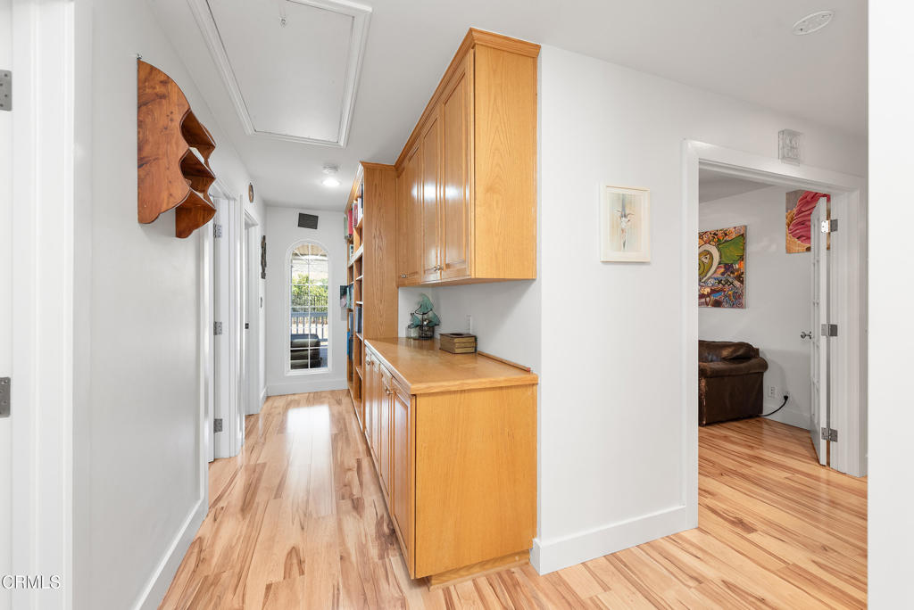 4850 North Moorpark Road Thousand Oaks, CA 91360 - Photo 21 of 54 a view of hallway with wooden floor
