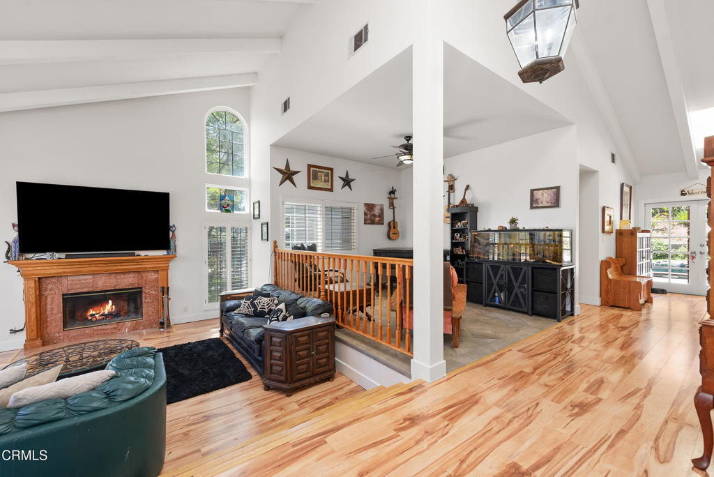 4850 North Moorpark Road Thousand Oaks, CA 91360 - Photo 8 of 54 a living room with furniture and a flat screen tv