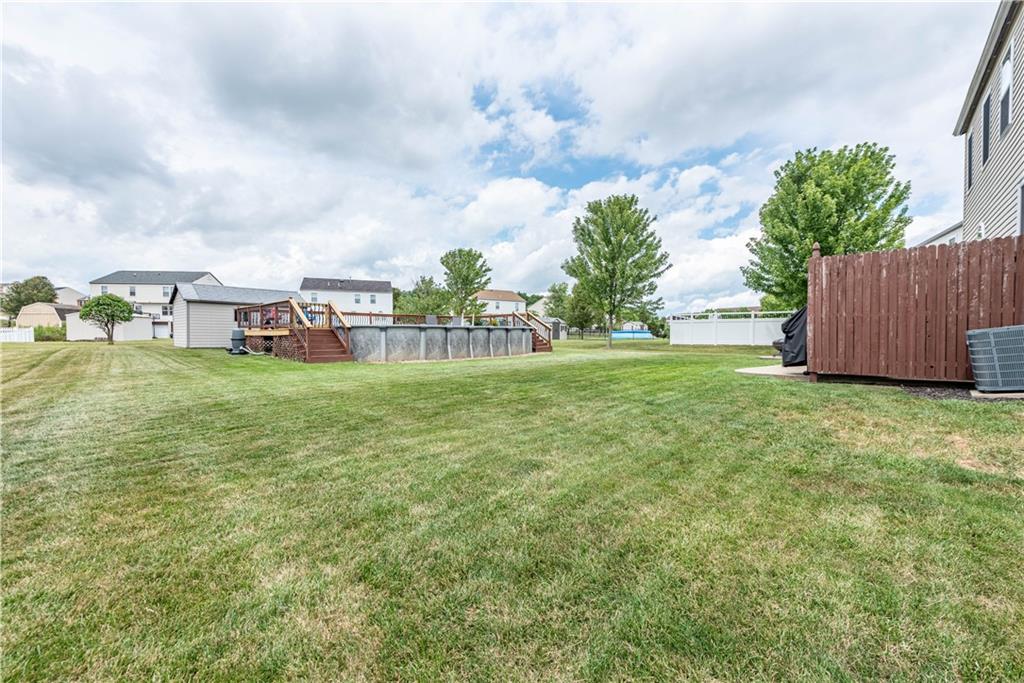 409 Commodore Drive McDonald, PA 15057 - Photo 42 of 49 a view of a garden with sitting area