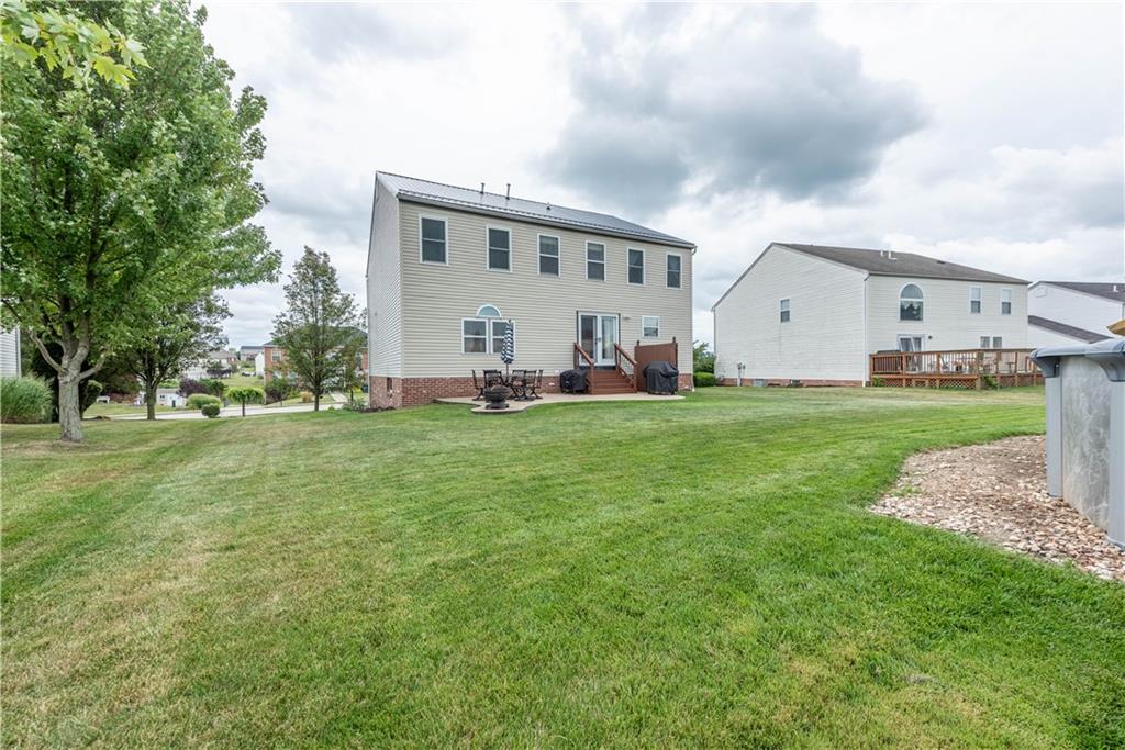 409 Commodore Drive McDonald, PA 15057 - Photo 48 of 49 a view of a house with a yard and sitting area
