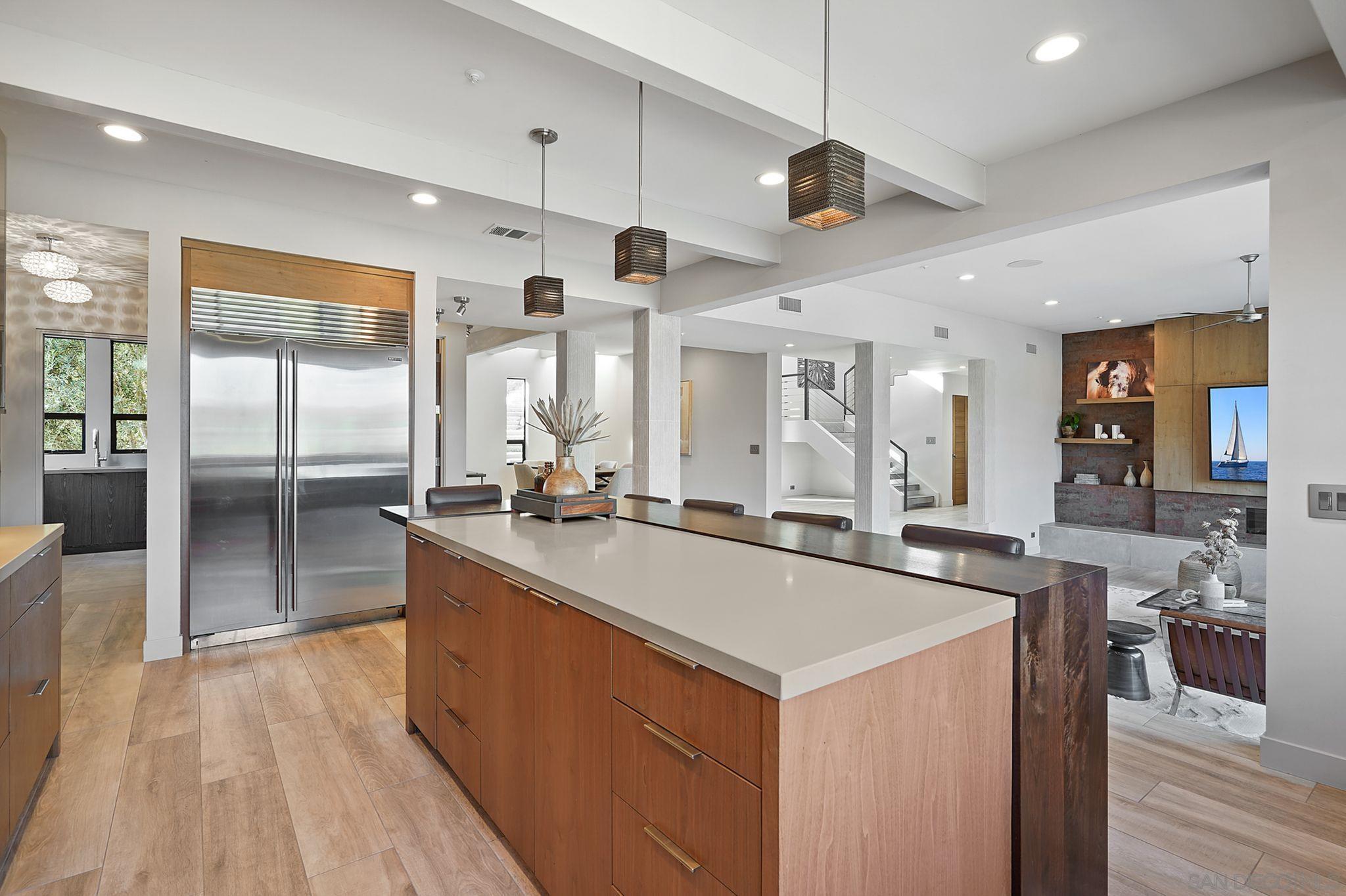 19969 Elfin Forest Lane Escondido, CA 92029 - Photo 19 of 53 a kitchen with stainless steel appliances a sink stove and refrigerator
