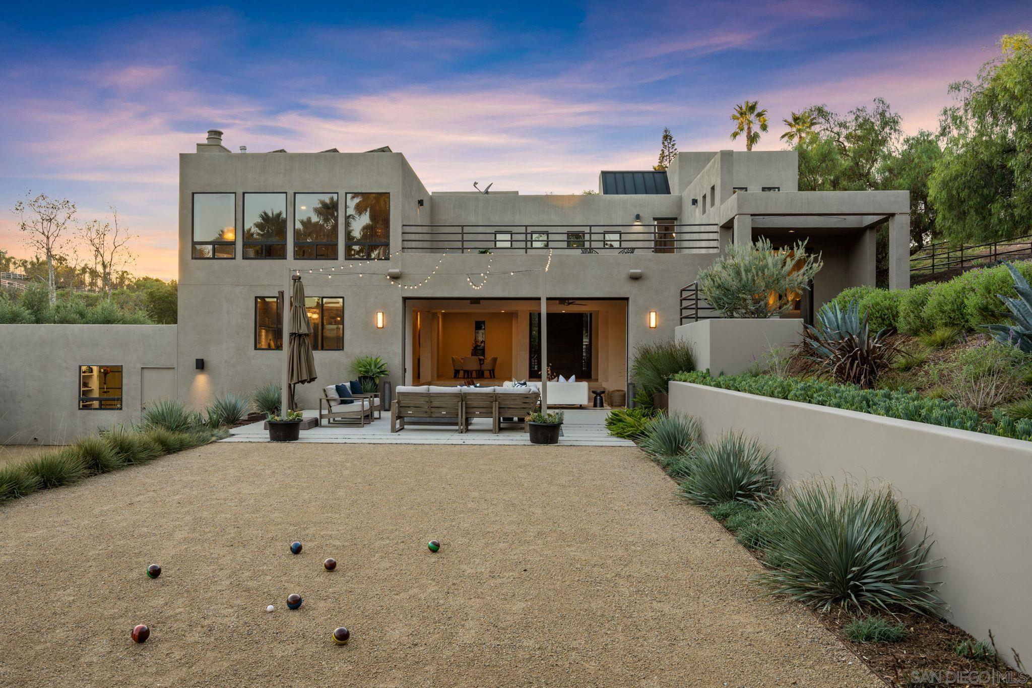 19969 Elfin Forest Lane Escondido, CA 92029 - Photo 2 of 53 a view of a white building with a yard in front of it