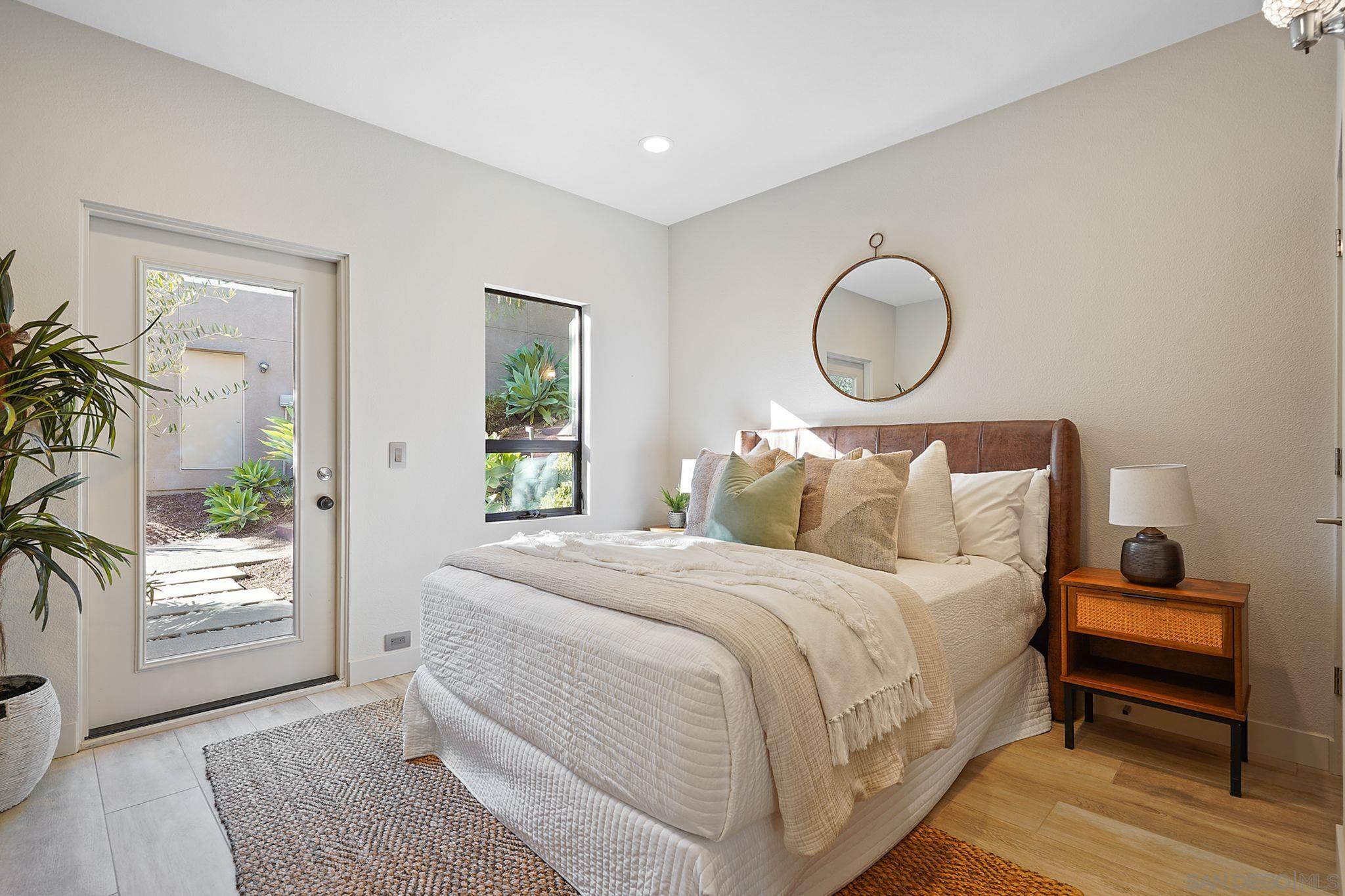 19969 Elfin Forest Lane Escondido, CA 92029 - Photo 21 of 53 a bedroom with bed and wooden floor