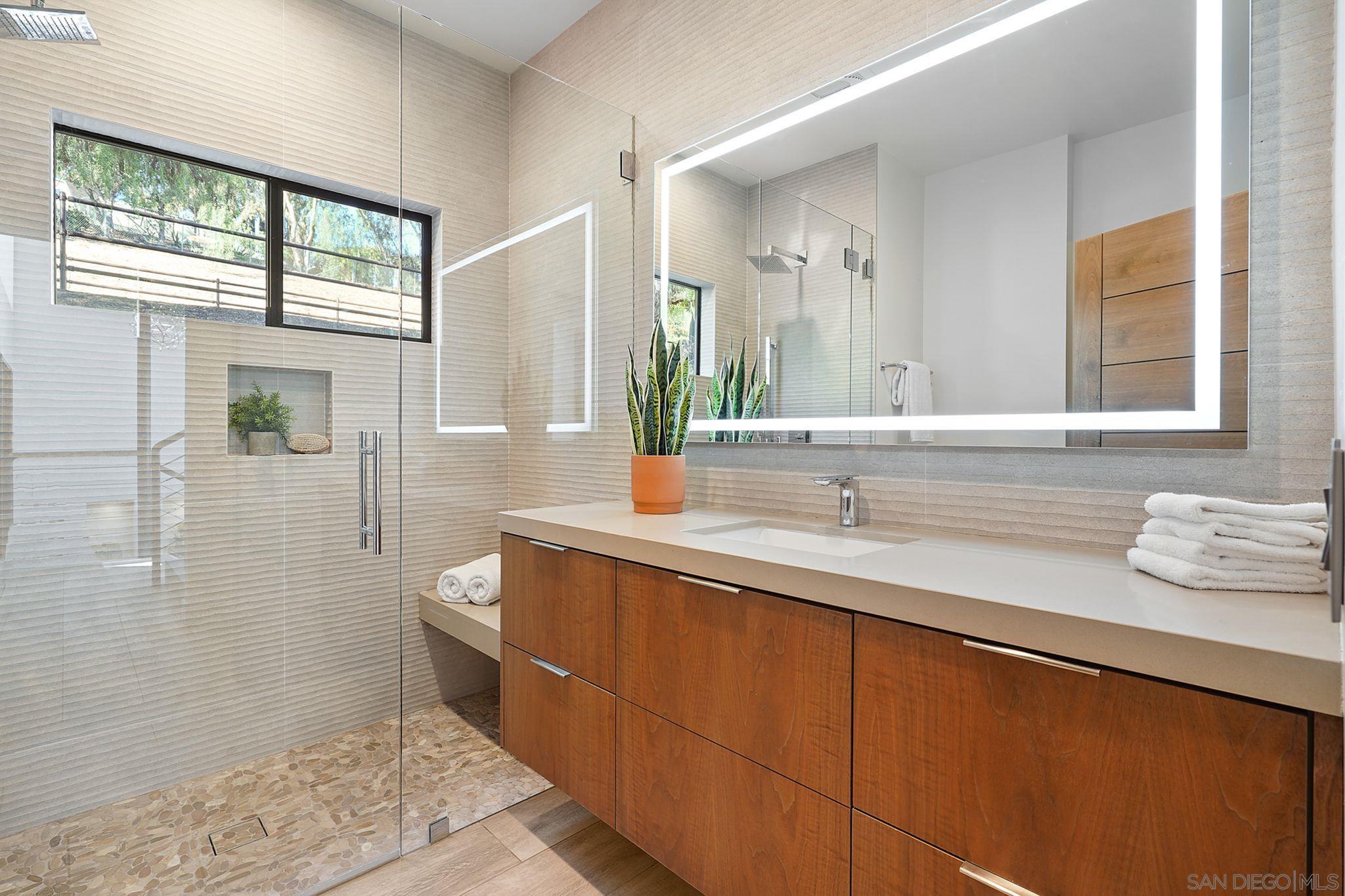 19969 Elfin Forest Lane Escondido, CA 92029 - Photo 22 of 53 a bathroom with a sink and a mirror