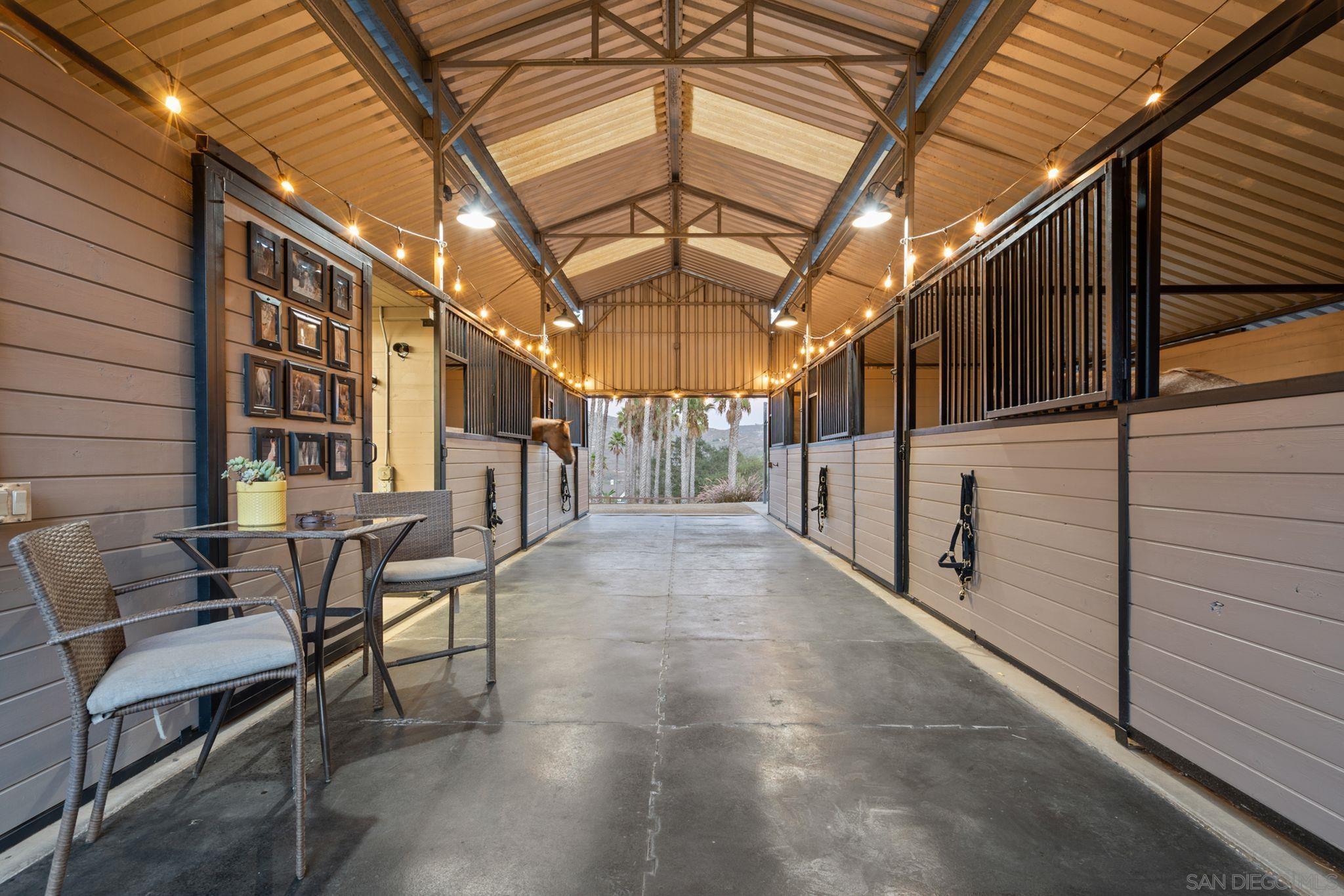 19969 Elfin Forest Lane Escondido, CA 92029 - Photo 3 of 53 a view of a porch with a bench