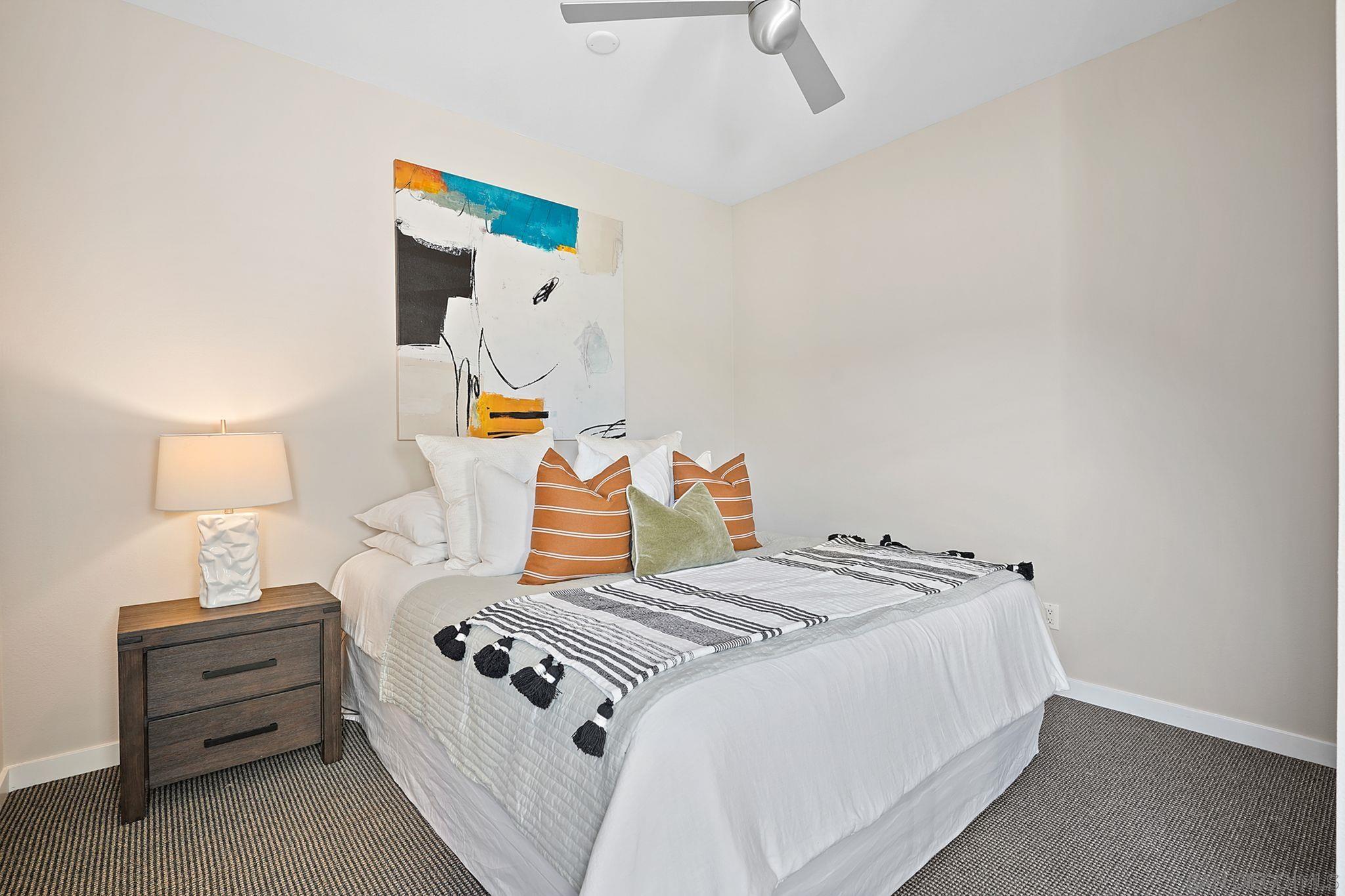 19969 Elfin Forest Lane Escondido, CA 92029 - Photo 44 of 53 a bedroom with a bed and a lamp