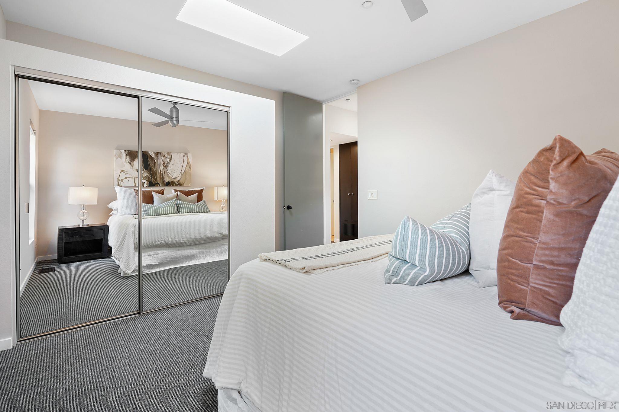 19969 Elfin Forest Lane Escondido, CA 92029 - Photo 45 of 53 a bedroom with a bed and mirror