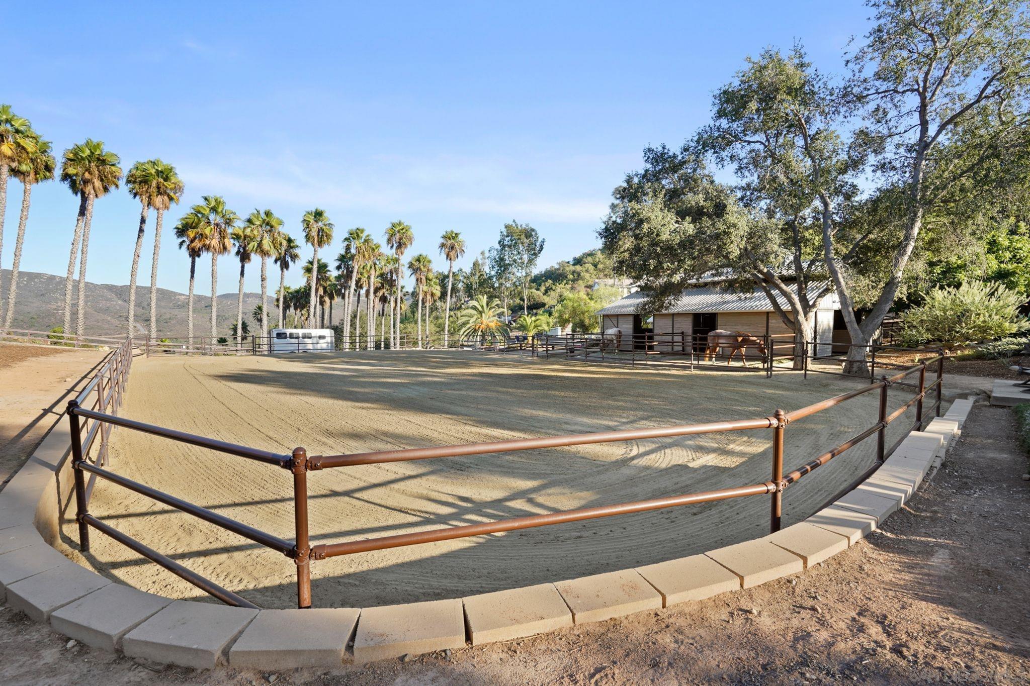 19969 Elfin Forest Lane Escondido, CA 92029 - Photo 50 of 53 a view of swimming pool with outdoor seating and trees in the background