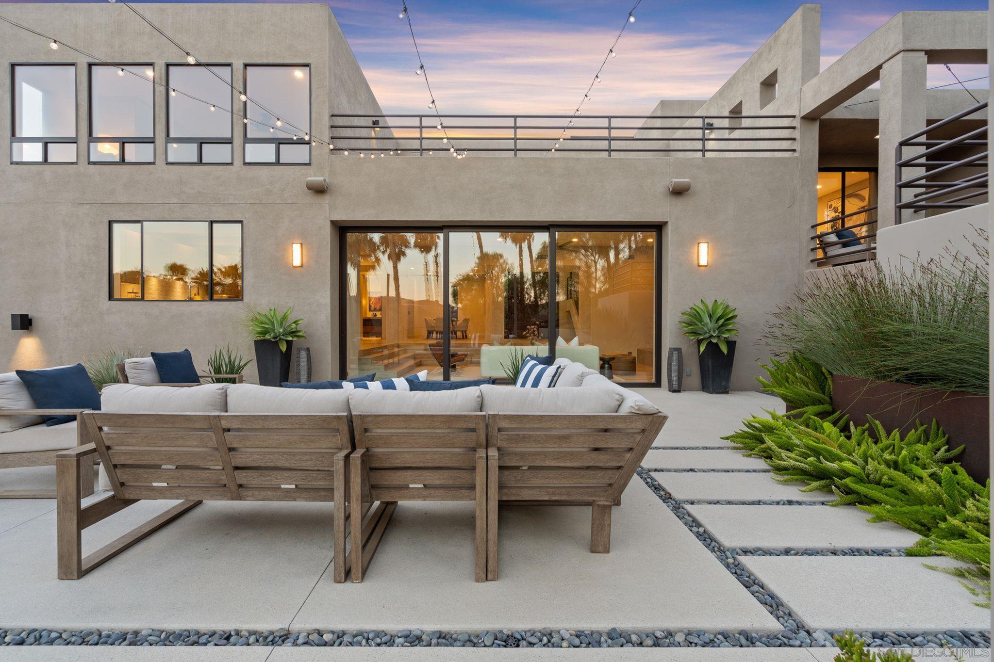 19969 Elfin Forest Lane Escondido, CA 92029 - Photo 8 of 53 a view of a patio with couches table and chairs and potted plants
