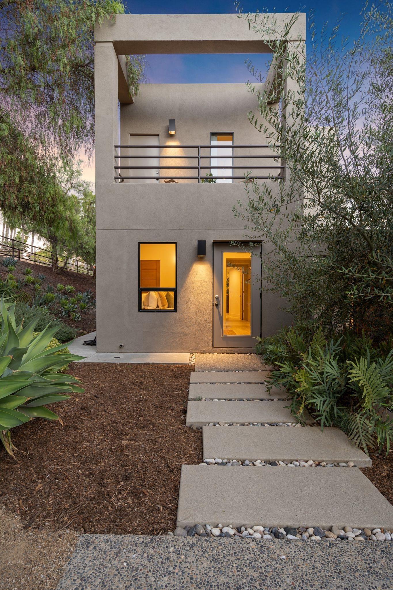 19969 Elfin Forest Lane Escondido, CA 92029 - Photo 10 of 53 a front view of a house with garden