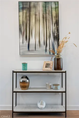 a view of wooden cabinet with a chair