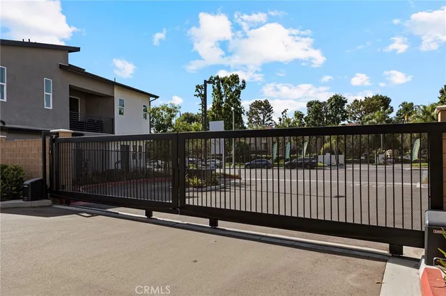 a view of a house with swimming pool in front of it