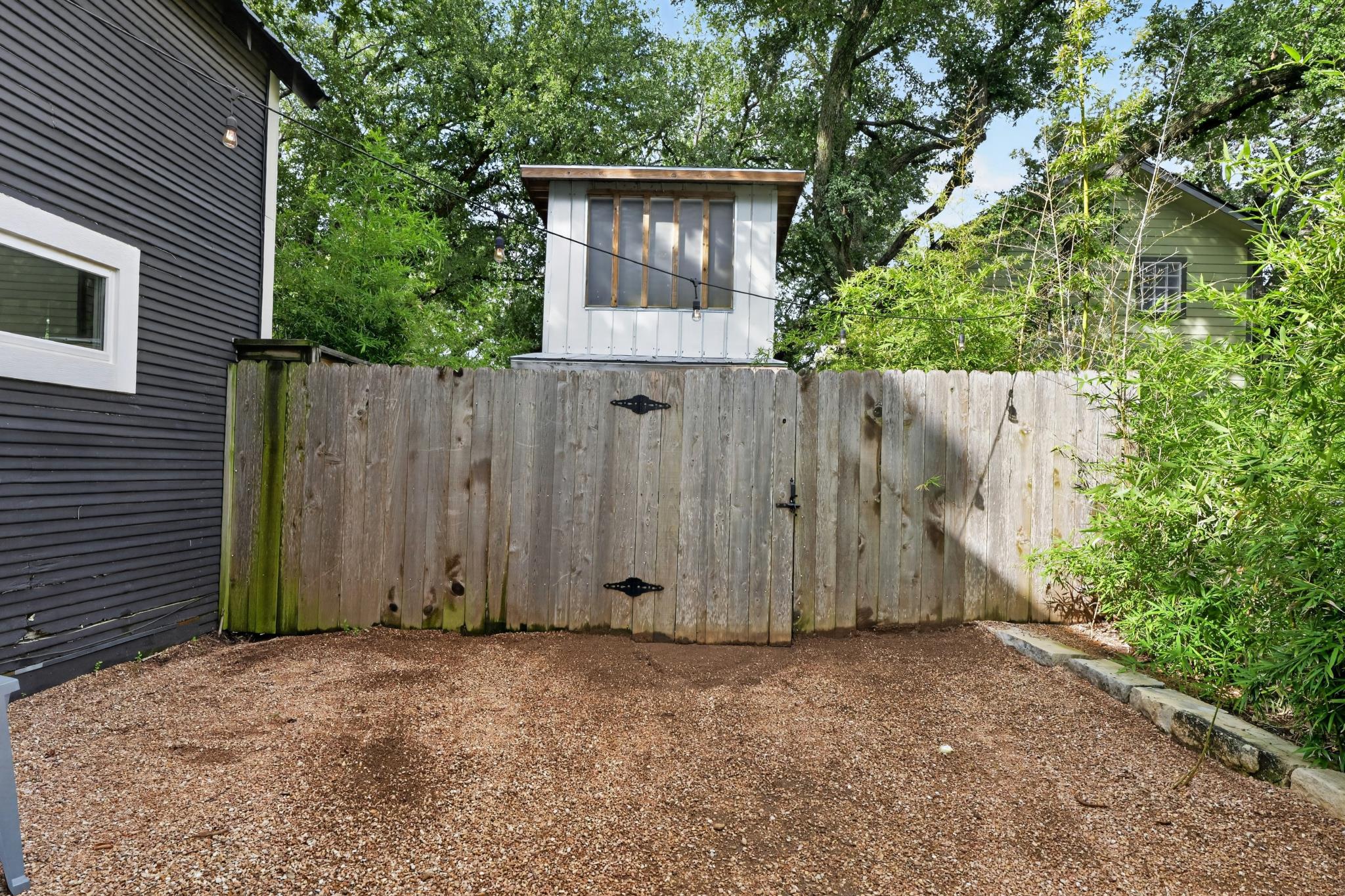307 East 35th Street, Unit A Austin, TX 78705 - Photo 11 of 40 A private, fenced outdoor space offers ample room for relaxation and recreation.