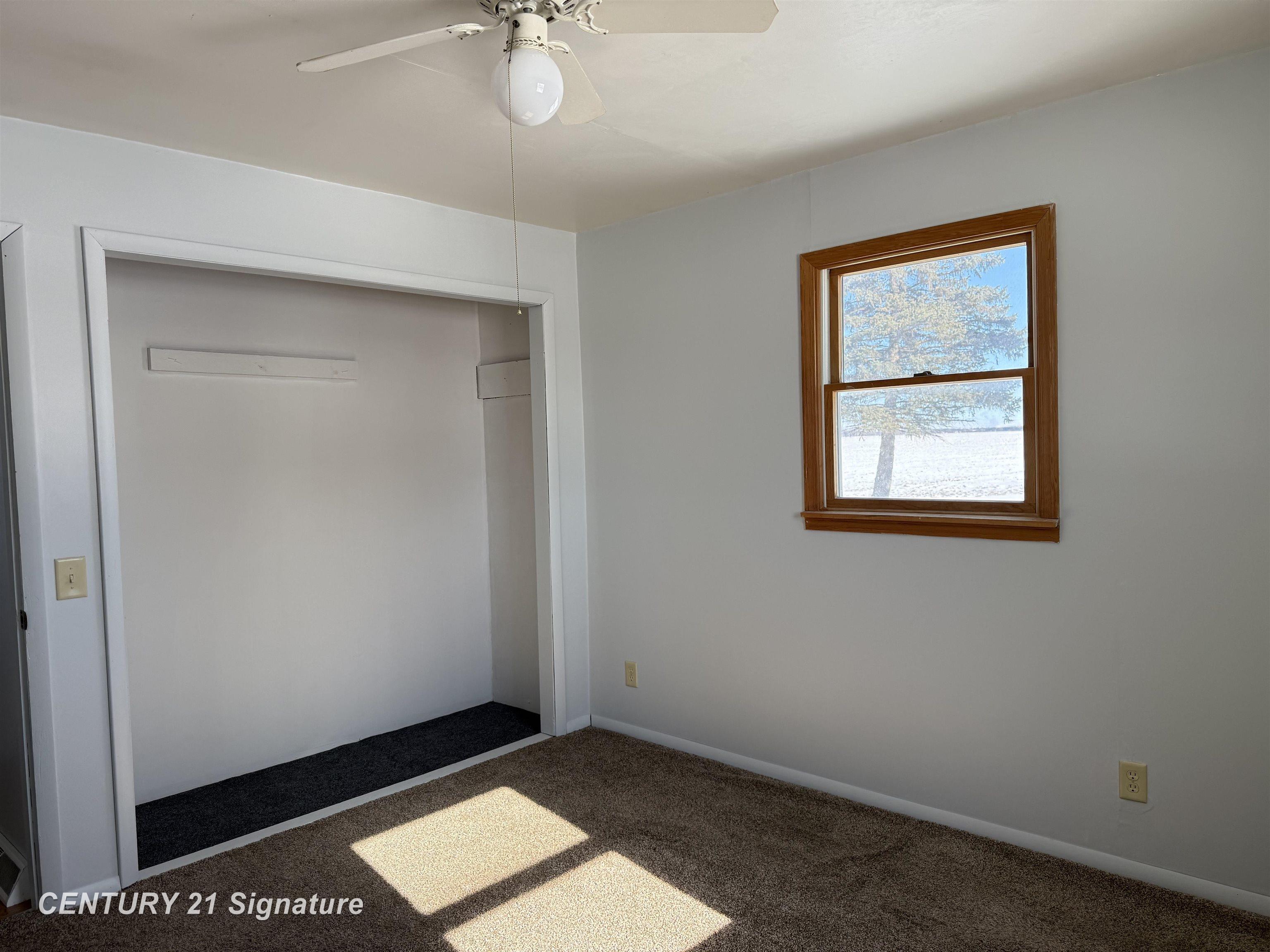 6867 7 Mile Road Freeland, MI 48623 - Photo 9 of 25 Bedroom 1 - closet area