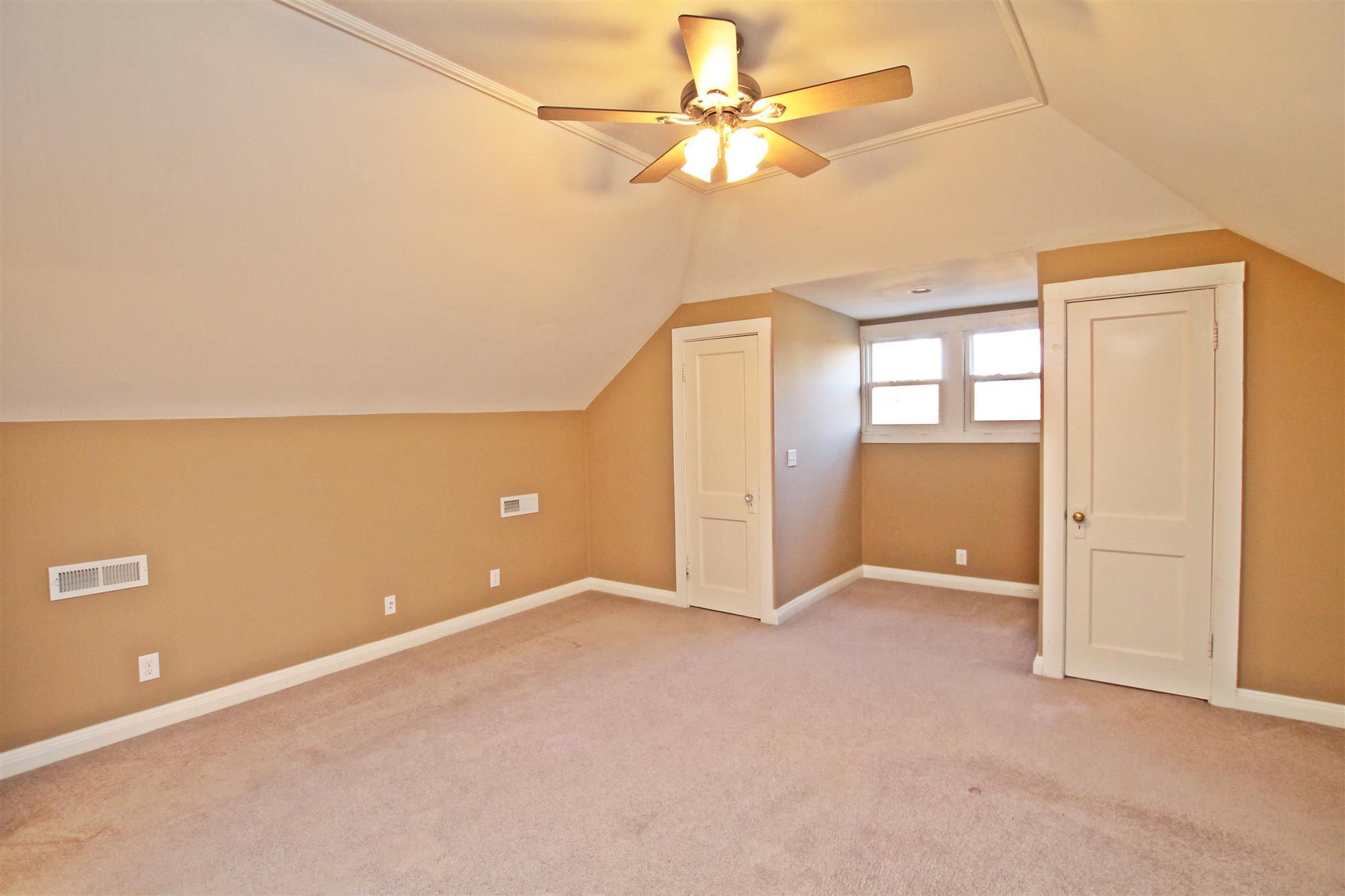 317 North Main Street Springfield, TN 37172 - Photo 12 of 30 an empty room with a ceiling fan and a window