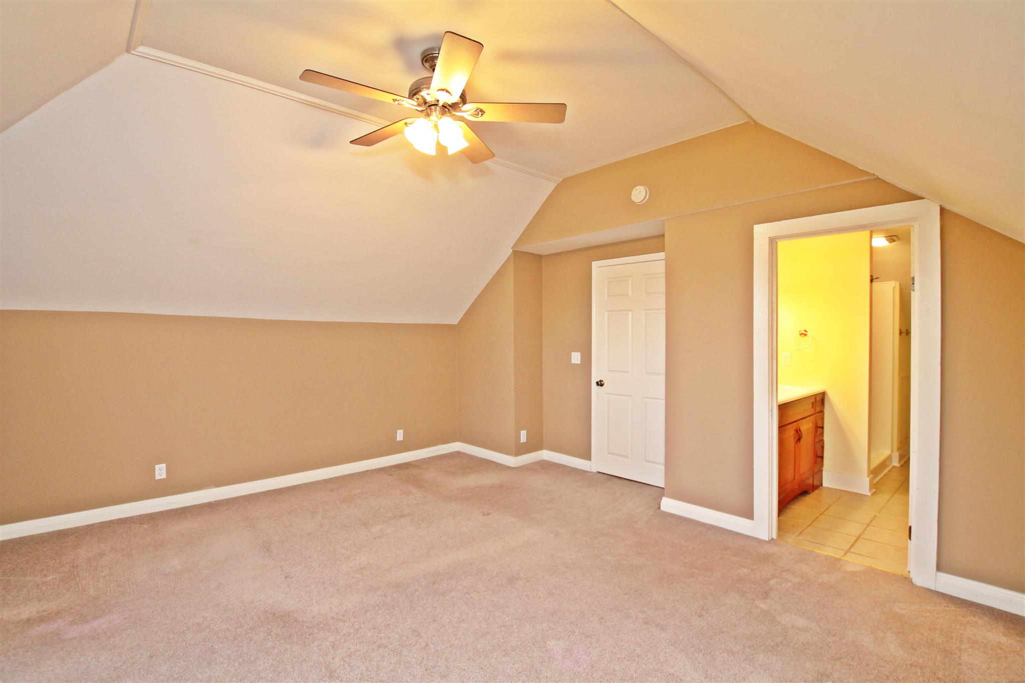 317 North Main Street Springfield, TN 37172 - Photo 13 of 30 an empty room with a ceiling fan and a window