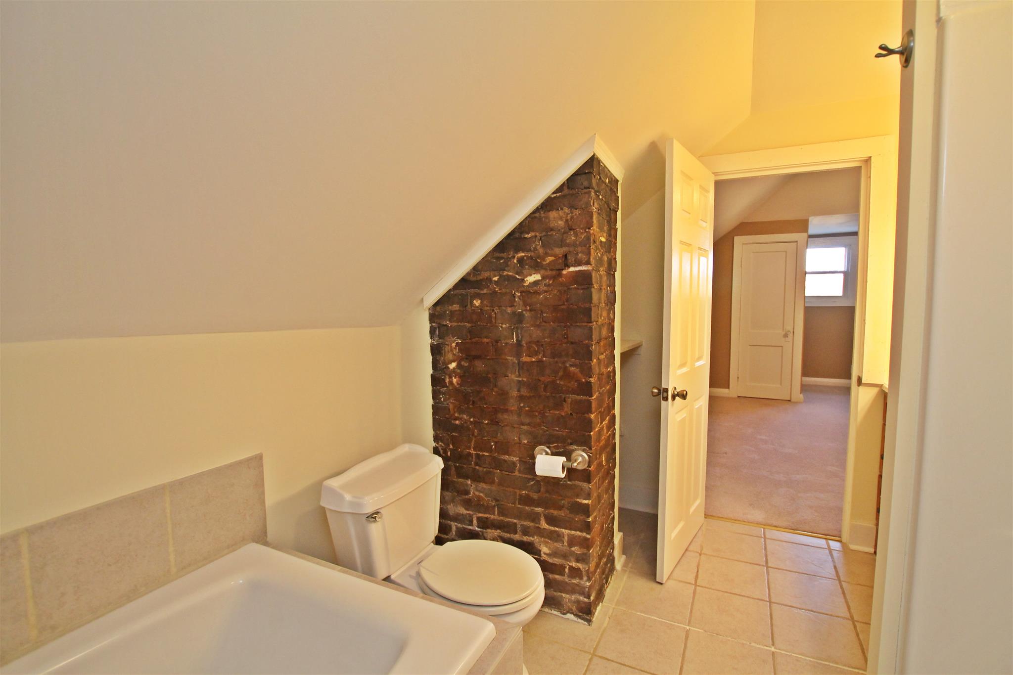 317 North Main Street Springfield, TN 37172 - Photo 15 of 30 a bathroom with a toilet and a shower