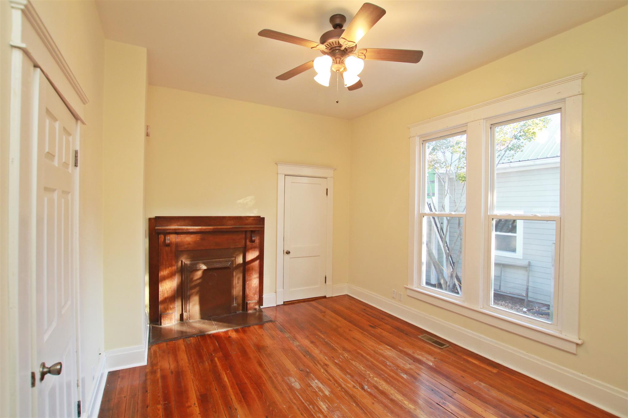317 North Main Street Springfield, TN 37172 - Photo 21 of 30 a view of empty room with wooden floor and fan