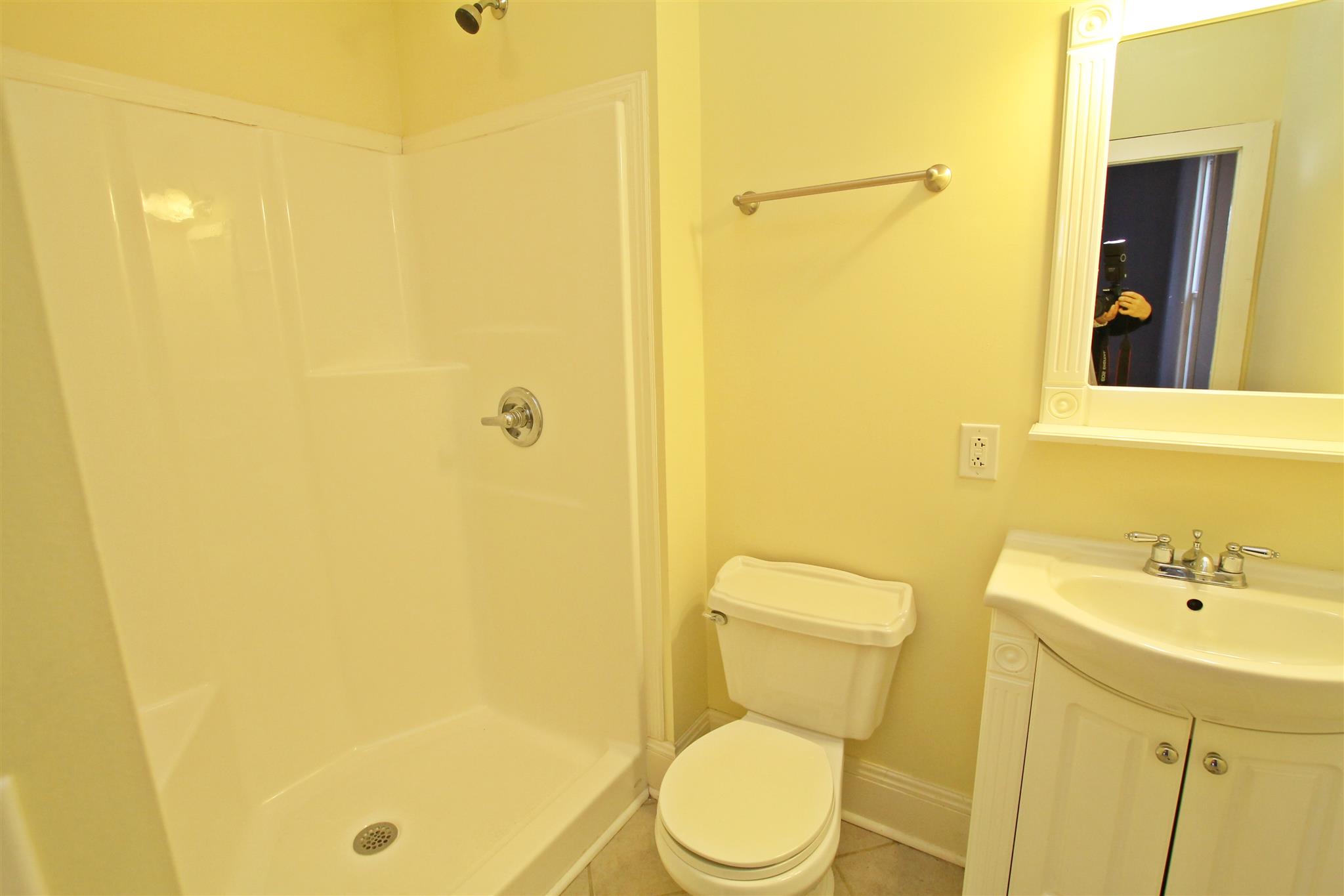 317 North Main Street Springfield, TN 37172 - Photo 24 of 30 a white toilet sitting next to a bathroom sink