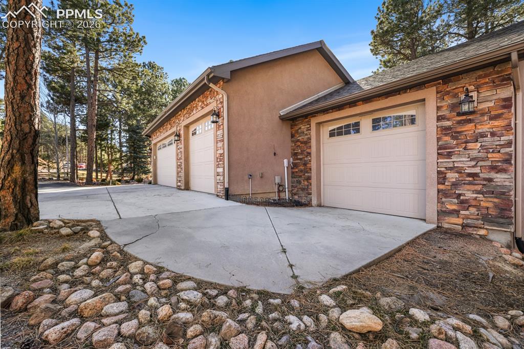 17990 Sawmill Road Colorado Springs, CO 80908 - Photo 7 of 40 Garage has bays for 4-cars