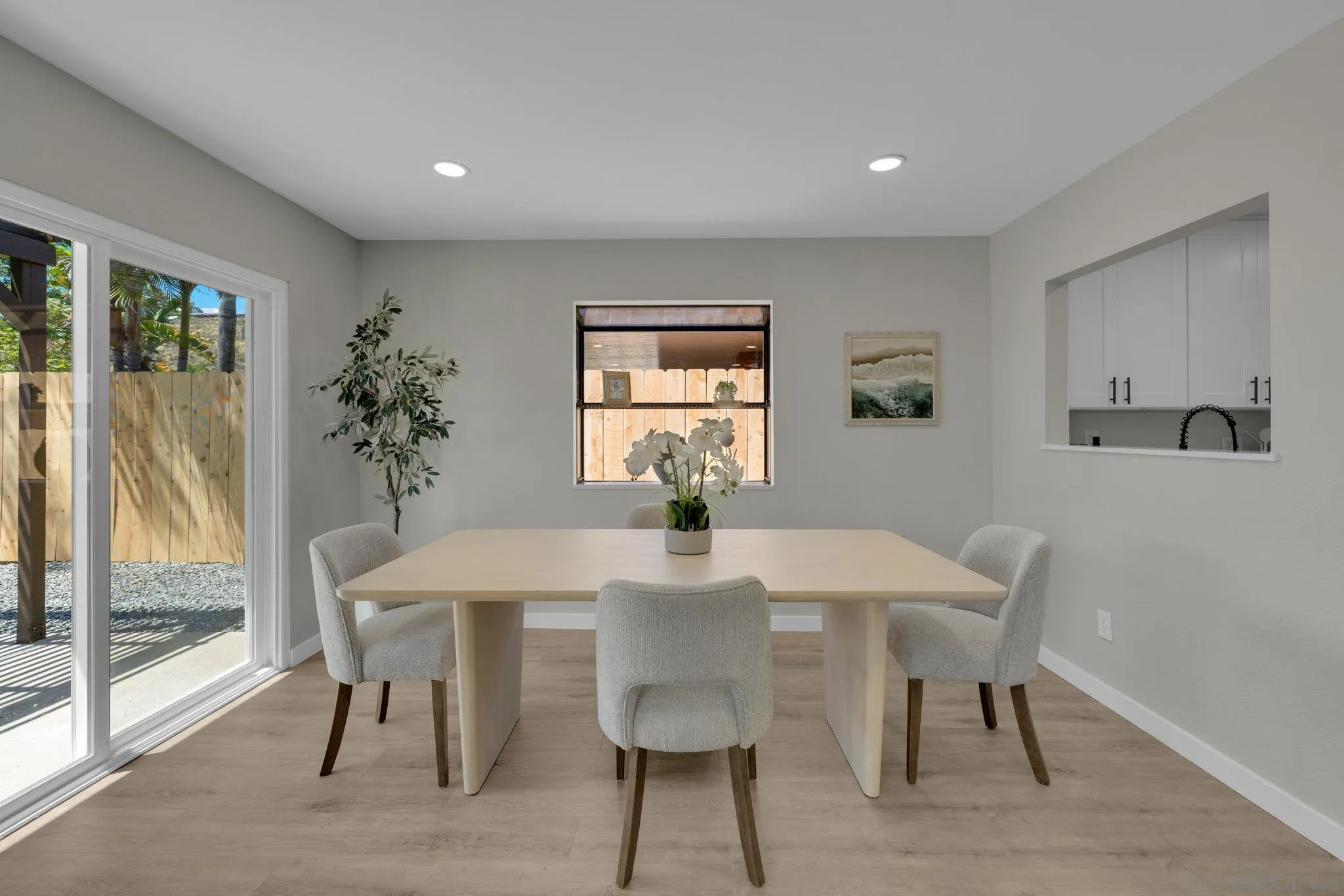 13322 Via Mark Poway, CA 92064 - Photo 10 of 25 a view of a dining room with furniture and window