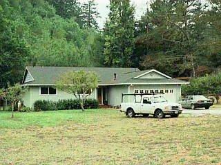 2260 Camp Road Sebastopol, CA 95472 - Photo 1 of 1 a car parked in front of white house