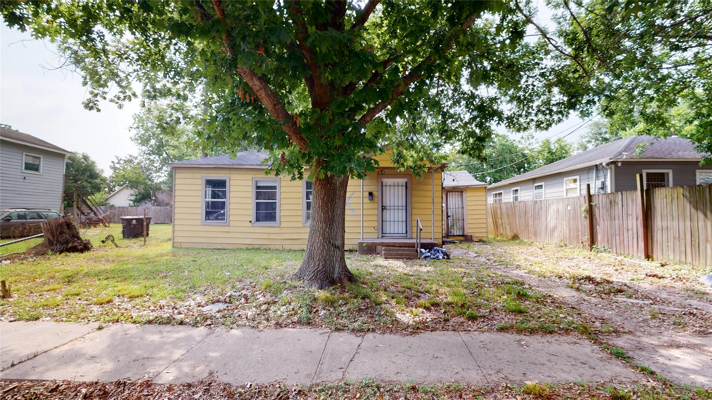 6604 Conley Street Houston, TX 77021 - Photo 2 of 28 a backyard of a house with seating space