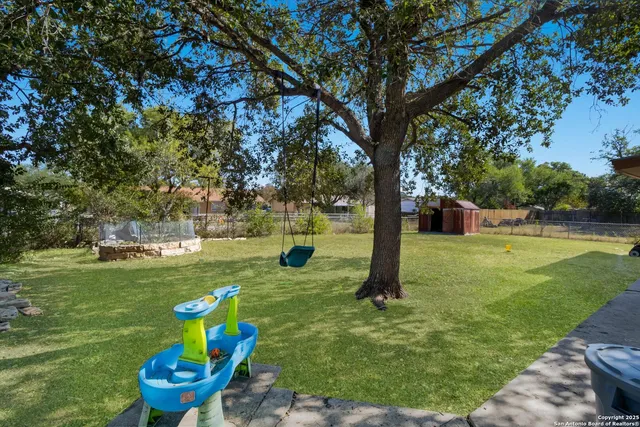 a view of a garden with a slide