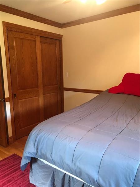 1133 Pine Run Road Apollo, PA 15613 - Photo 18 of 25 3rd bedroom with crown molding and oak floors.