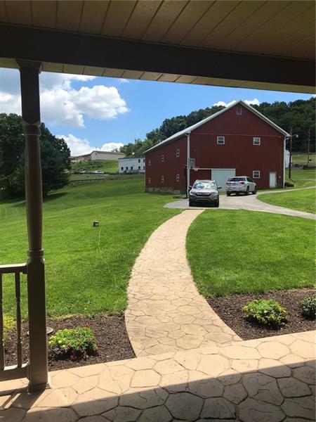 1133 Pine Run Road Apollo, PA 15613 - Photo 4 of 25 The front porch is just a few steps to the barn and garage.
