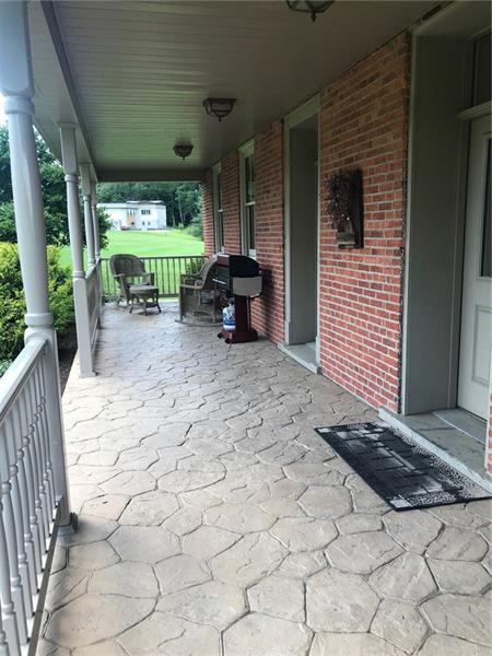 1133 Pine Run Road Apollo, PA 15613 - Photo 5 of 25 Cement patio on front porch.