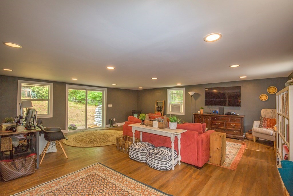 8 Dean Pond Road Brimfield, MA 01010 - Photo 10 of 31 a living room with furniture and a large window