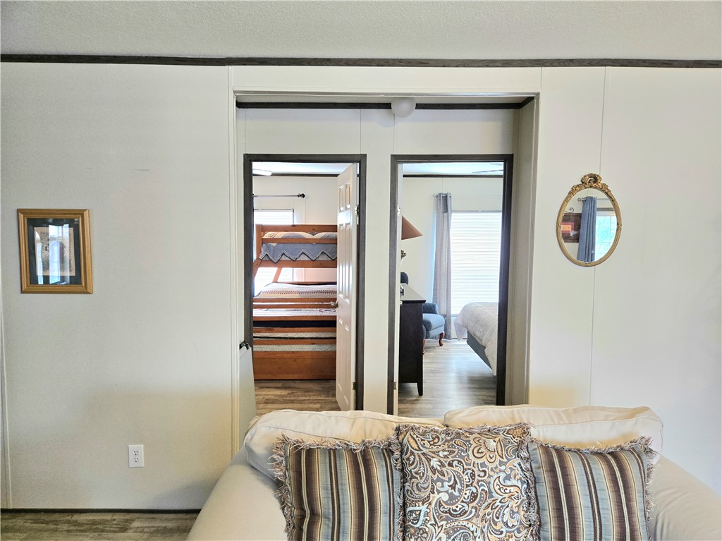 401 Raiders Road Somerville, TX 77879 - Photo 21 of 30 a bedroom with a bed and a table in it