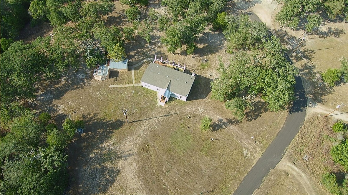 401 Raiders Road Somerville, TX 77879 - Photo 28 of 30 a view of a yard with plants